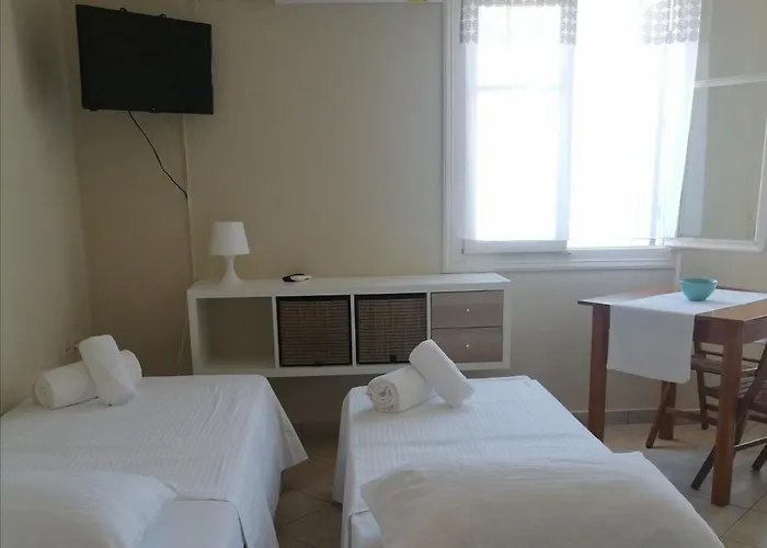 Ta Adelfia بيلوس